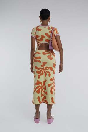 Arthur Apparel Hole Dress in Tequila Sunrise. Midi dress in yellow and orange for hire. Back cut out.