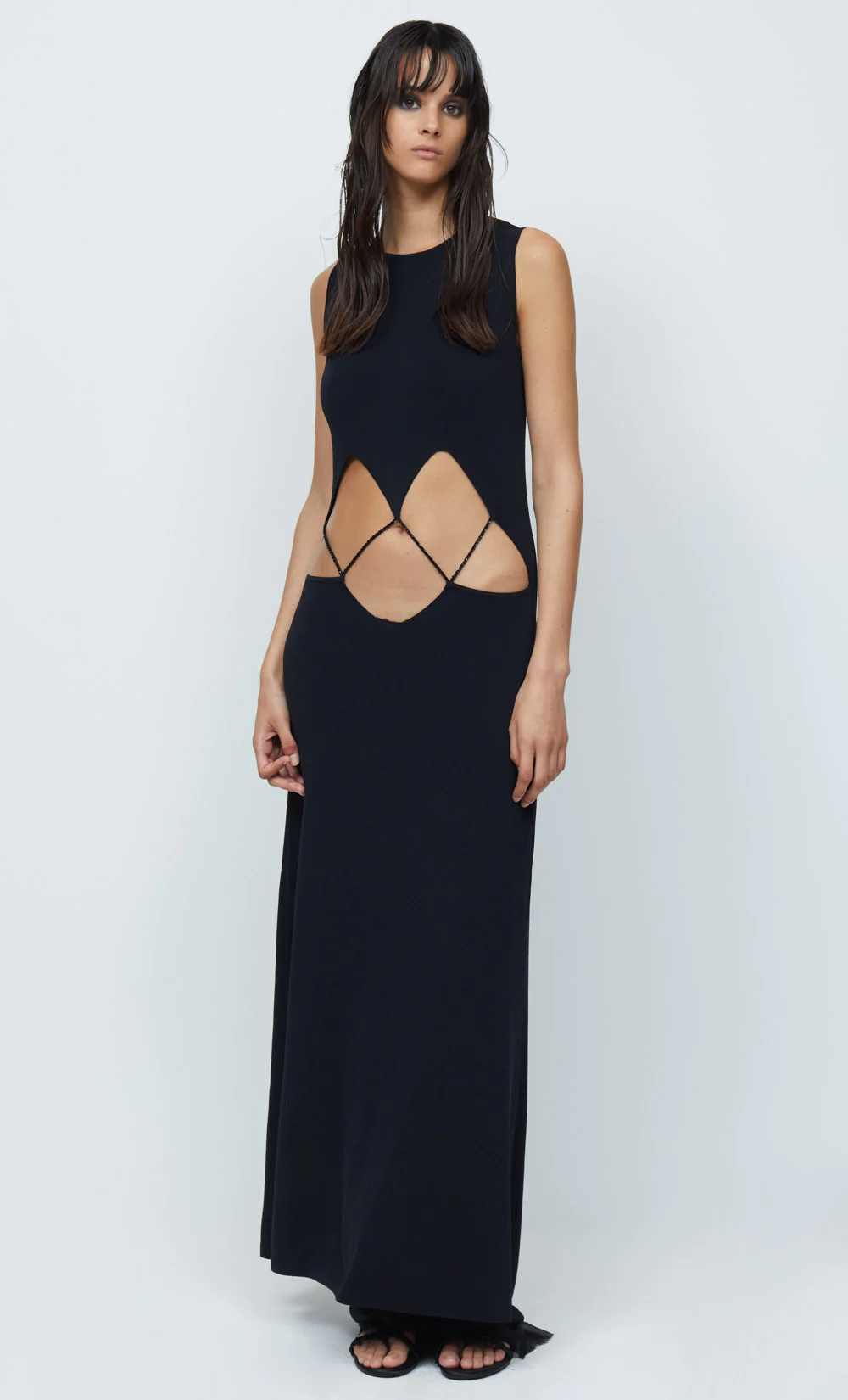 Bec and Bridge Skylar Suspend Knit Maxi Dress for rent. Black sleeveless maxi with front cut out.