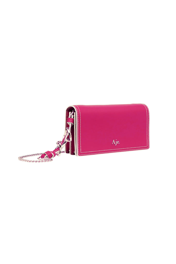 Aje Roux Chain Clutch Bag in Fuschia Pink for hire.