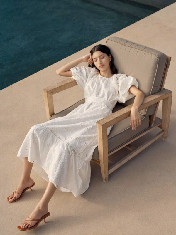 Aje Silvatica Broderie Midi Dress. White midi dress with short puff sleeves.