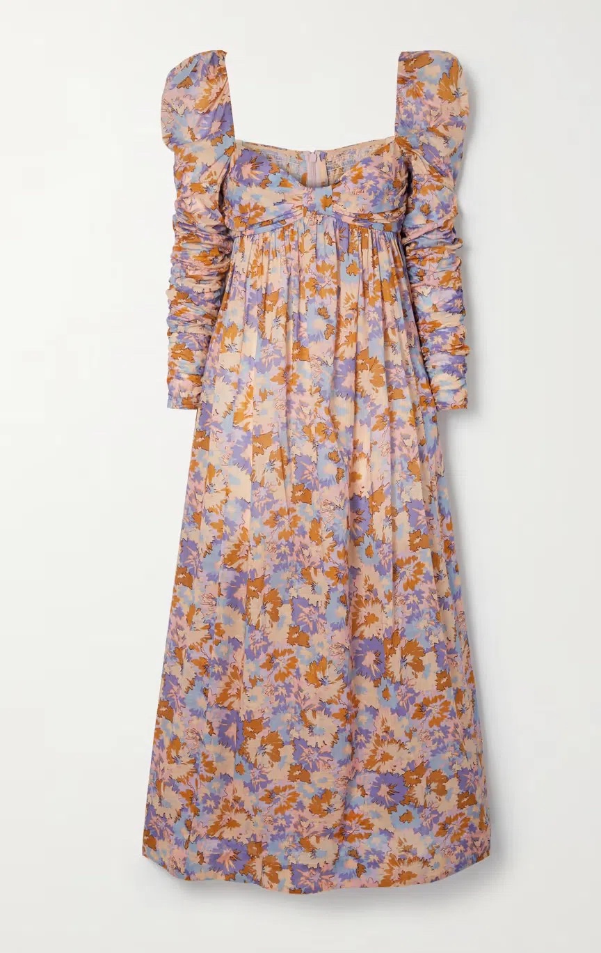 Zimmermann's dress is printed with abstract florals in warm, colorful hues. Made from lightweight cotton-voile, it has a sweetheart neckline framed by lightly puffed shoulders and a gathered empire waist. The ruched sleeves add to the feminine feel.