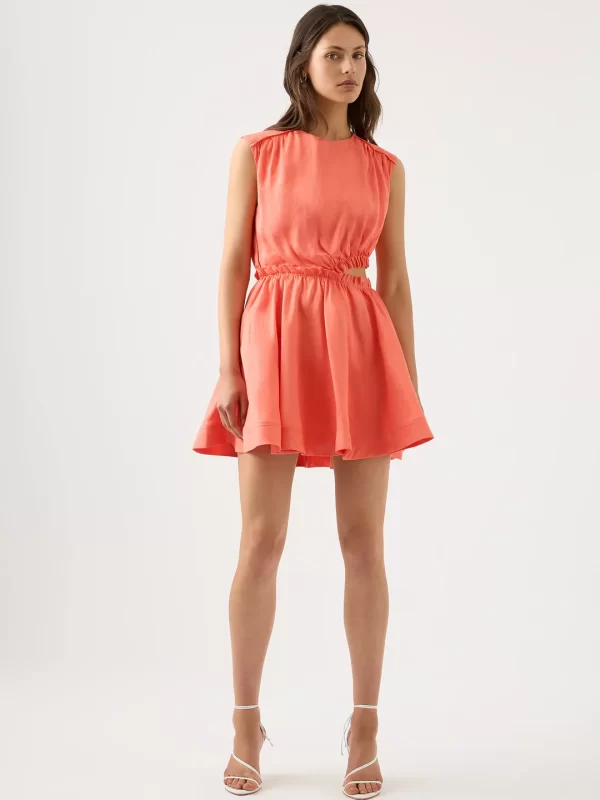 Orange mini dress with a boat neckline and left side cutout.