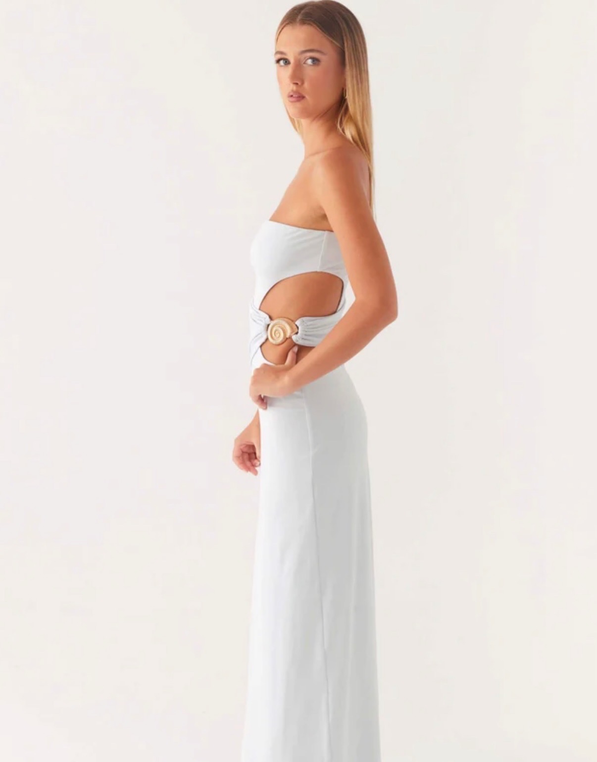 Peppermayo plae blue dress with cutout and gold shell side view.