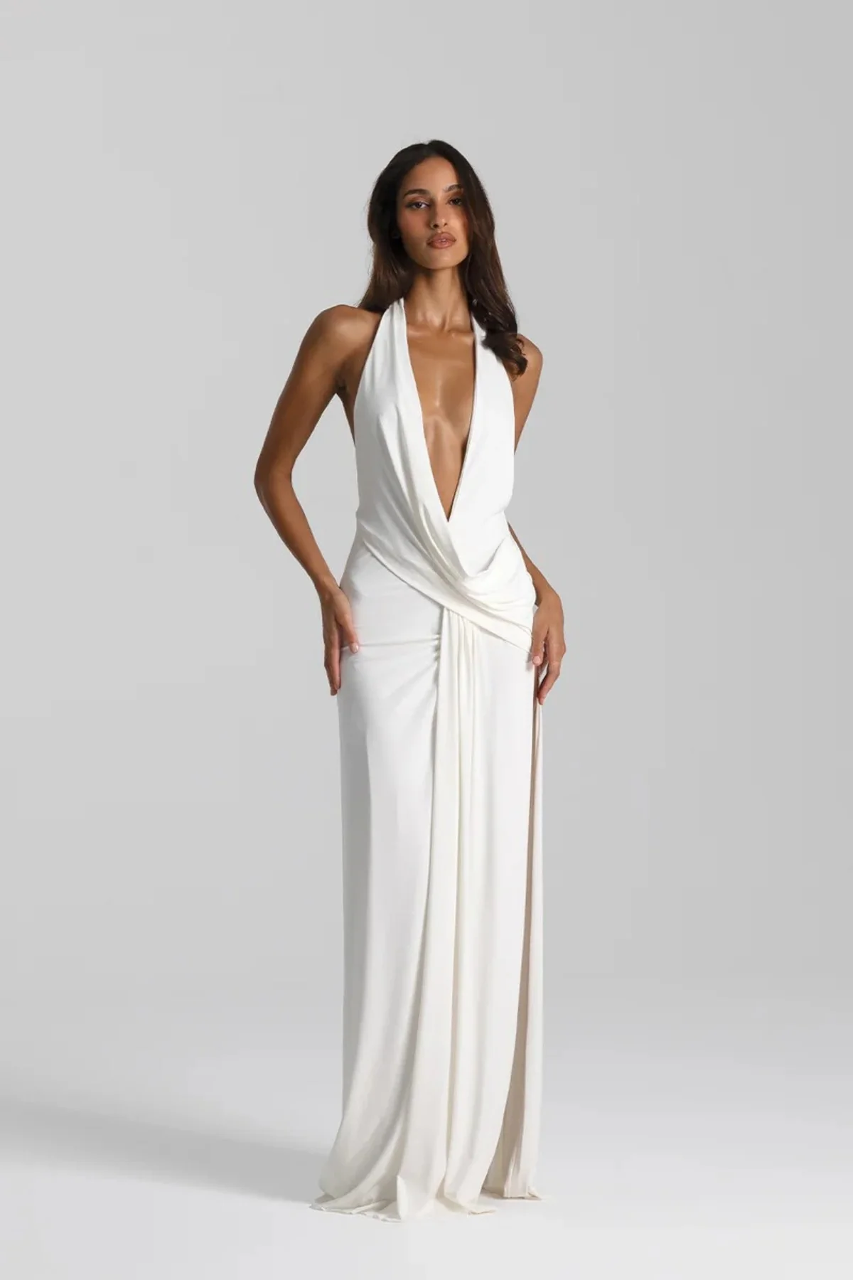 5285-Winona Gown White by Natalie Rolt a draped halter gown with open back and side split. Perfect for formal evening events.